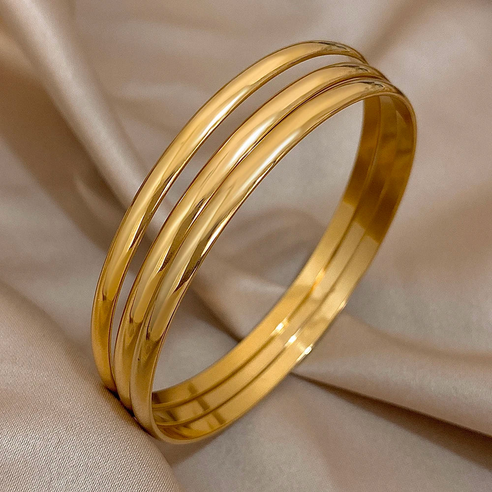 Set of 3 Glossy 18K Gold-Plated Stainless Steel Bangle Bracelets – Chic and Stylish