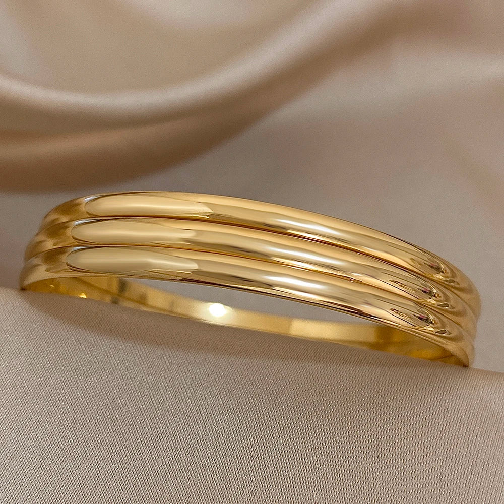 Set of 3 Glossy 18K Gold-Plated Stainless Steel Bangle Bracelets – Chic and Stylish