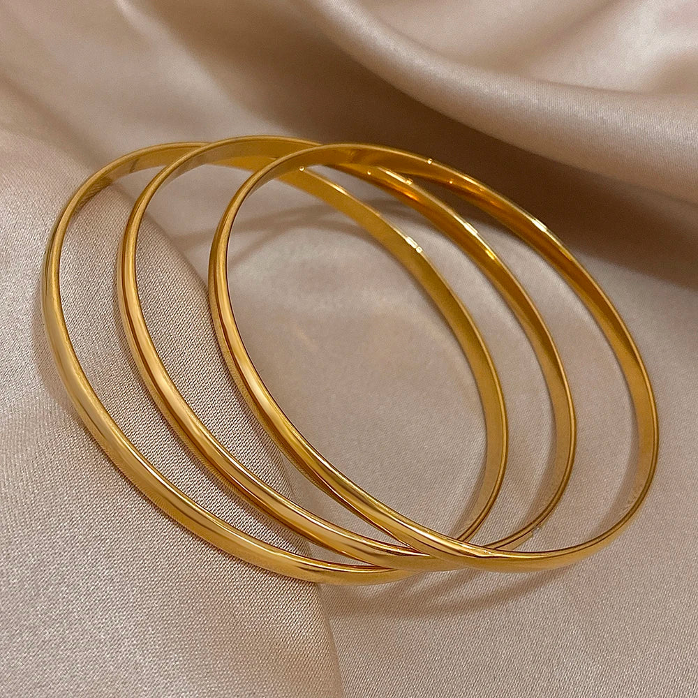 Set of 3 Glossy 18K Gold-Plated Stainless Steel Bangle Bracelets – Chic and Stylish